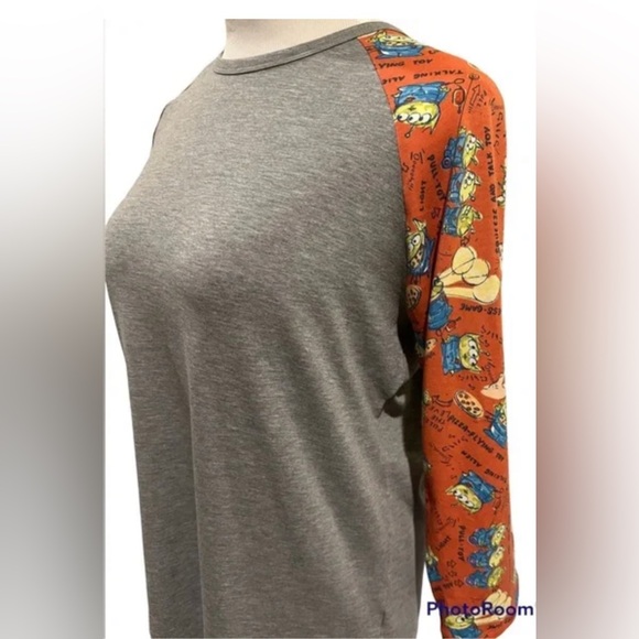 LuLaRoe Tops - LulaRoe RARE Toy Story Disney Randy Pixar Green Alien Shirt Large Baseball Tee